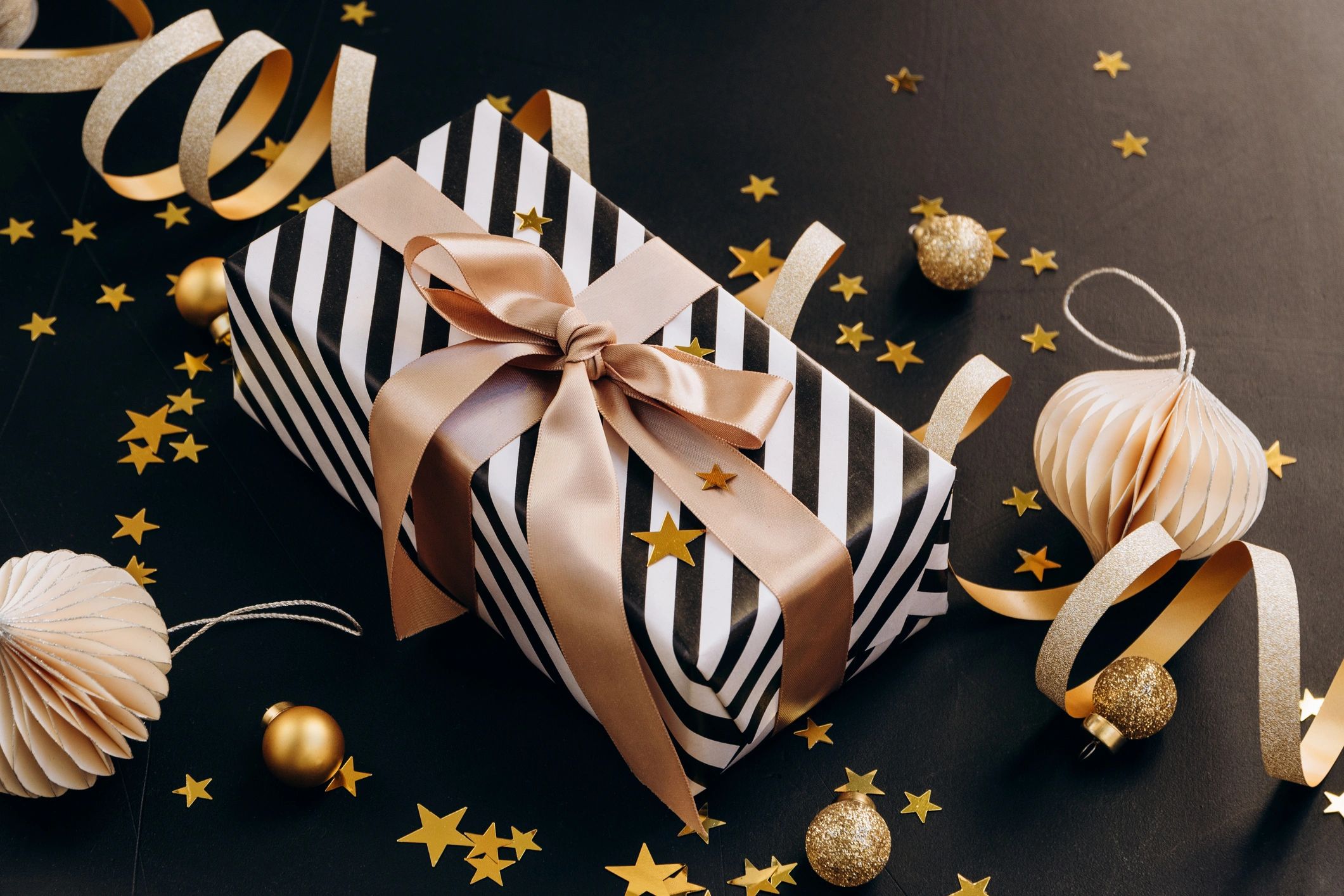 Decorative gift box styling on dark background